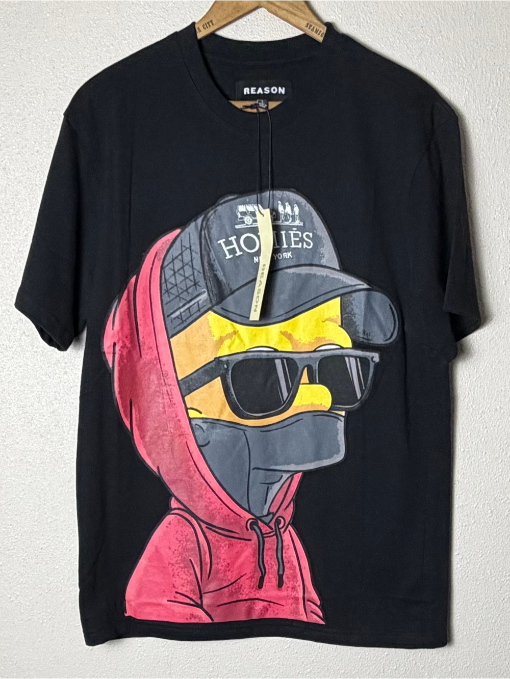 Reason Black Tee with Pink Hoodie & Yellow Face Cartoon